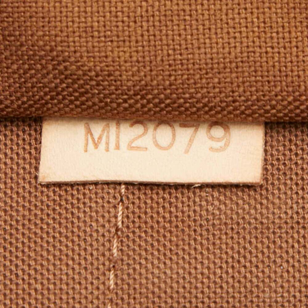 LOUIS VUITTON Authentic Brown Monogram Leather Tote Bag - Picture 13 of 13
